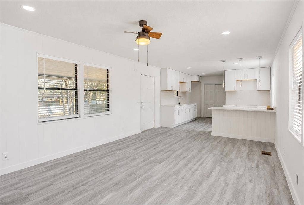 6048 Hidden Circle, Azle, TX 76020 Light gray wood-finish flooring, white walls, and recessed lighting