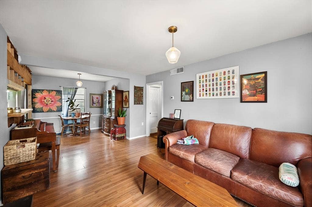1405 Grace Street, Arlington, TX 76010 Hardwood flooring extends throughout