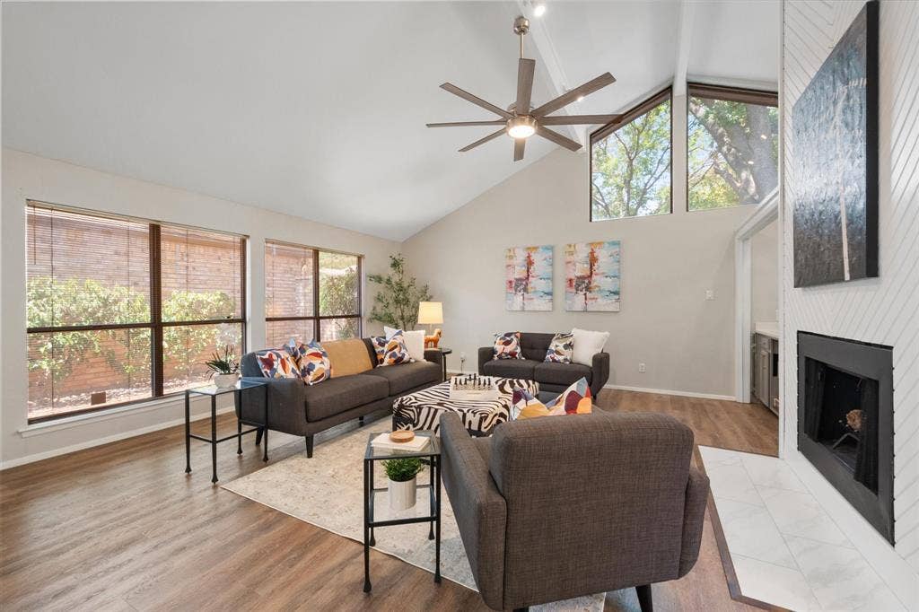 2216 Winter Sunday Way, Arlington, TX 76012 Spacious Living Room with lots of natural light pouring in from back courtyard