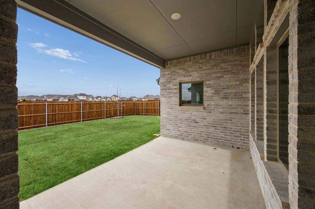 Covered Patio in the Gilmour II home plan by Trophy Signature Homes – REPRESENTATIVE PHOTO