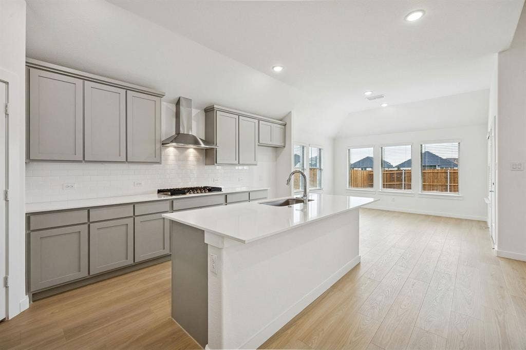 Kitchen in the Gilmour II home plan by Trophy Signature Homes – REPRESENTATIVE PHOTO