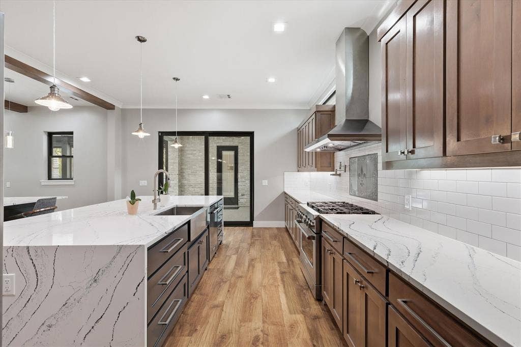 211 Shahan Drive, Shady Shores, TX 76208 Kitchen with view out to the outdoor kitchen