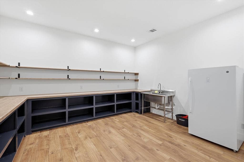 211 Shahan Drive, Shady Shores, TX 76208 Huge pantry room with sink and freezer