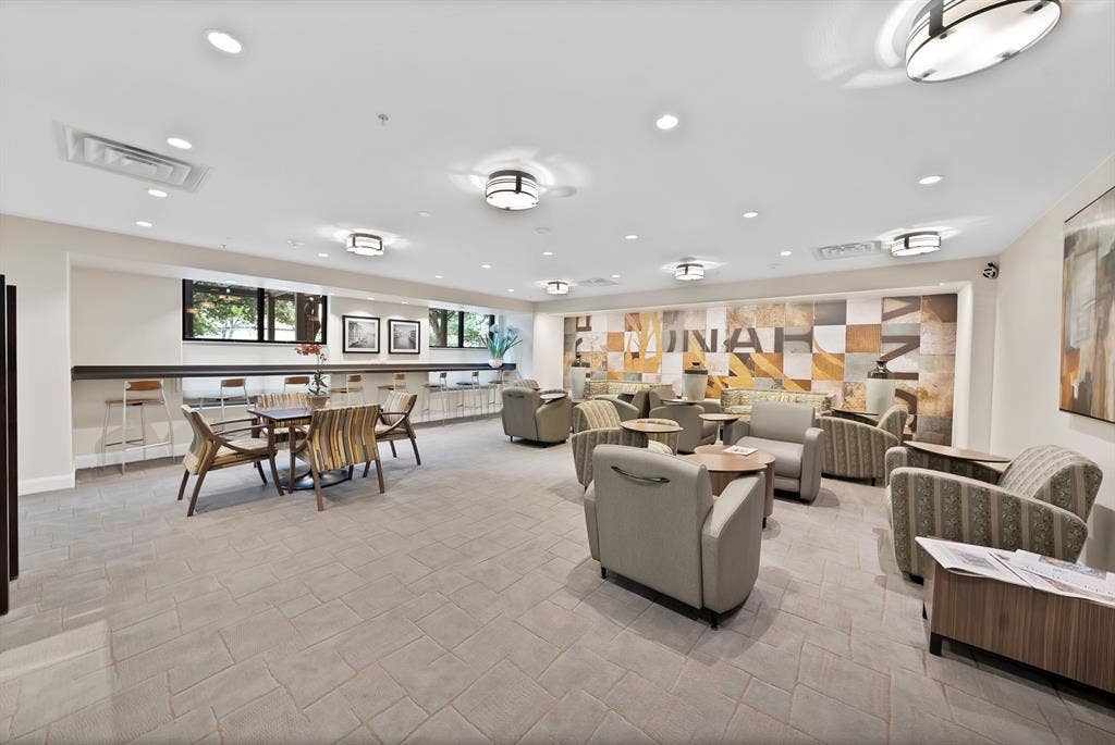 330 Las Colinas Boulevard E, #338, Irving, TX 75039 Spacious common area featuring recessed lighting, ceiling-mounted fixtures, and a decorative accent wall