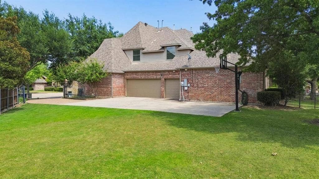 1712 Singletree Court, McKinney, TX 75072 Separate grassy areas provide room for recreation beyond the pool and outdoor entertaining spaces.