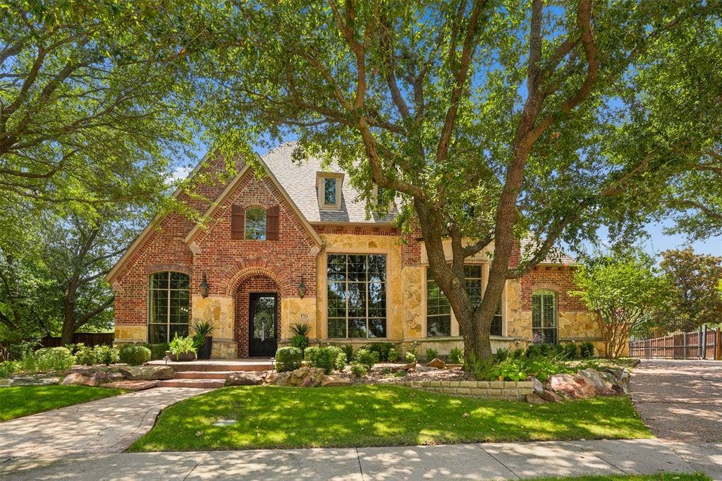 1712 Singletree Court, McKinney, TX 75072 Center cul-de-sac setting, mature landscaping and timeless custom architecture create exceptional drive-up appeal.