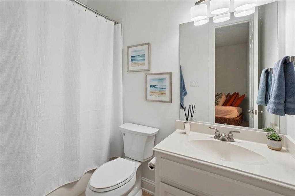 1712 Singletree Court, McKinney, TX 75072 Private secondary bath provides convenient en-suite access for the downstairs bedroom.