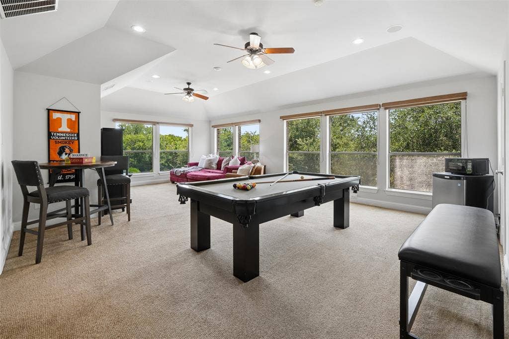 1712 Singletree Court, McKinney, TX 75072 Exceptionally large upstairs game room offers space for billiards, media, play and multiple activity zones.
