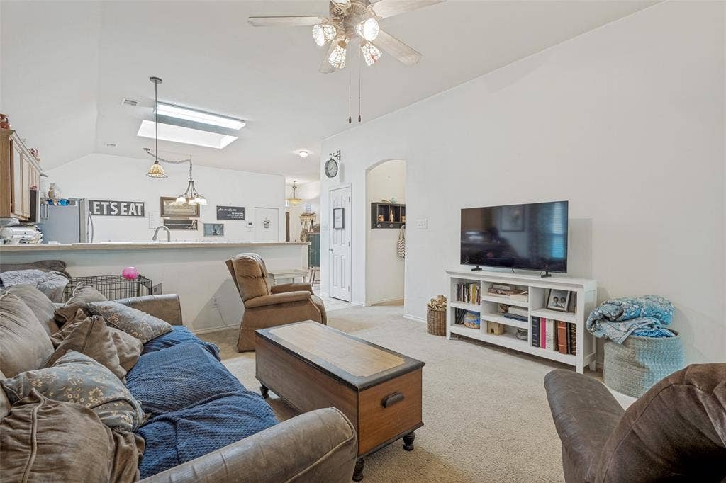 2118 Hanakoa Falls Drive, Anna, TX 75409 Vaulted ceilings enhance the living space, featuring a ceiling fan.