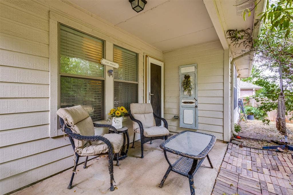 2118 Hanakoa Falls Drive, Anna, TX 75409 Covered patio featuring concrete flooring and a brick-patterned walkway