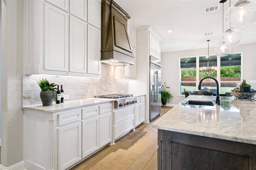 1021 Williams Lane, Copper Canyon, TX 75077 Custom Cabinetry, SS Appliances & Quartzite Counter Tops.