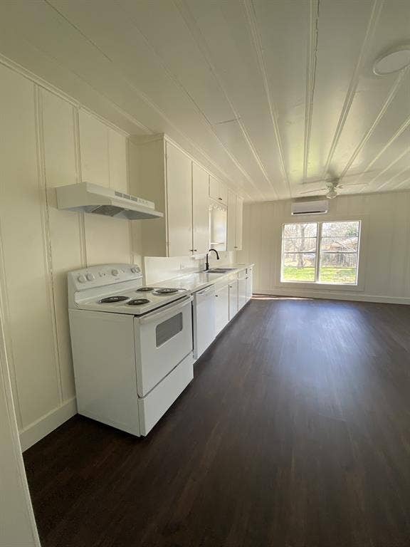 801 Walnut Street, Trinidad, TX 75163 Dark wood-finish flooring, white cabinetry, white electric range, white range hood, and a ceiling-mounted fan