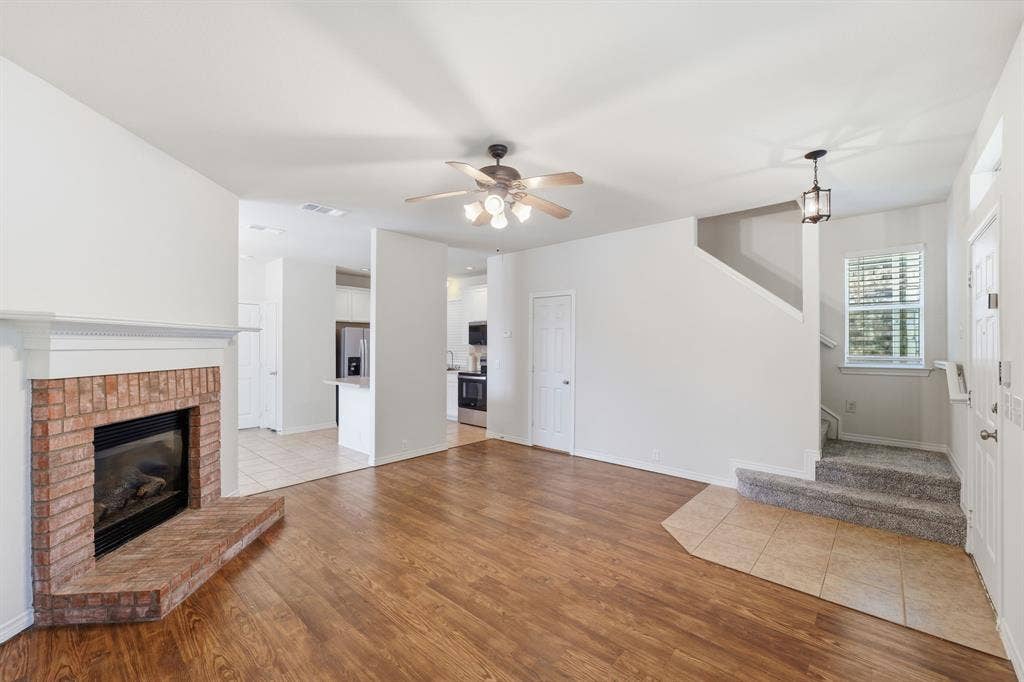 7449 Danbridge Lane, Frisco, TX 75035 Living room featuring abundant natural light and fresh interior paint.