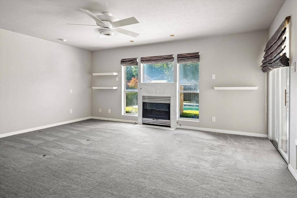 4108 Myerwood Lane, Dallas, TX 75244 Spacious Primary with gas fireplace and sliding door access to pool.