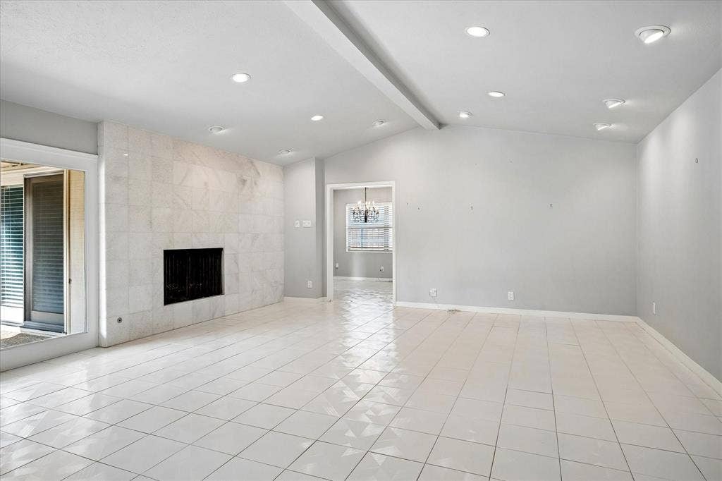 4108 Myerwood Lane, Dallas, TX 75244 Family room with marble wood burning fireplace and French doors to the pool.