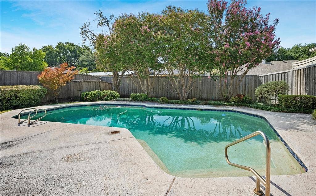 4108 Myerwood Lane, Dallas, TX 75244 Freeform pool with a shaded, fully fenced backyard
