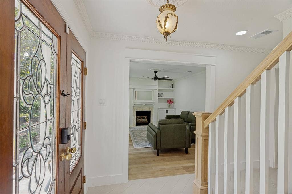 4316 Springbranch Drive, Benbrook, TX 76116 Wood-paneled front door with leaded glass inserts