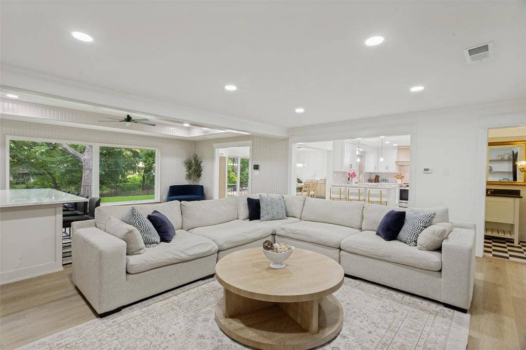 4316 Springbranch Drive, Benbrook, TX 76116 Recessed ceiling lighting, wood-finish flooring, expansive windows, open-concept design, and a ceiling fan
