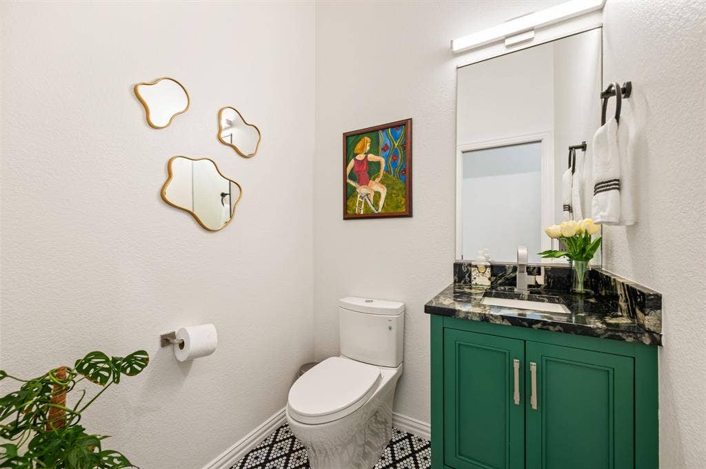 2404 Watercrest Drive, Keller, TX 76248 Custom stylish half bath was added to the home. Located to the right of dining room. So beautiful and charming!