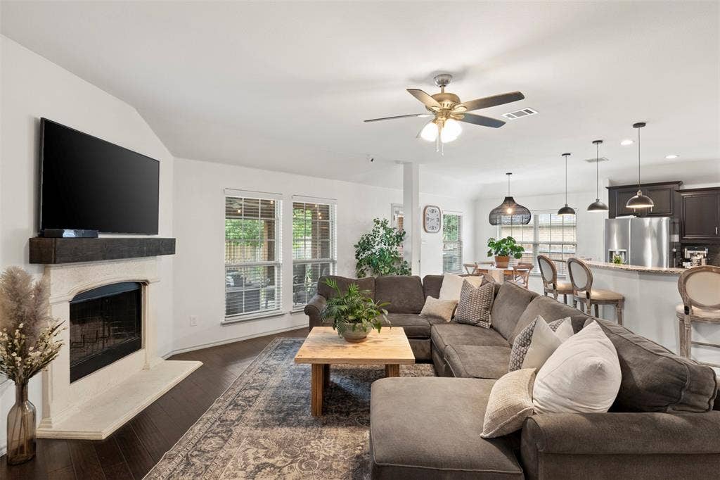 2189 Liriope Lane, Waxahachie, TX 75165 From the living room, the home's layout really comes together—kitchen, breakfast area and main living space remain open and connected without sacrificing clearly defined spaces.