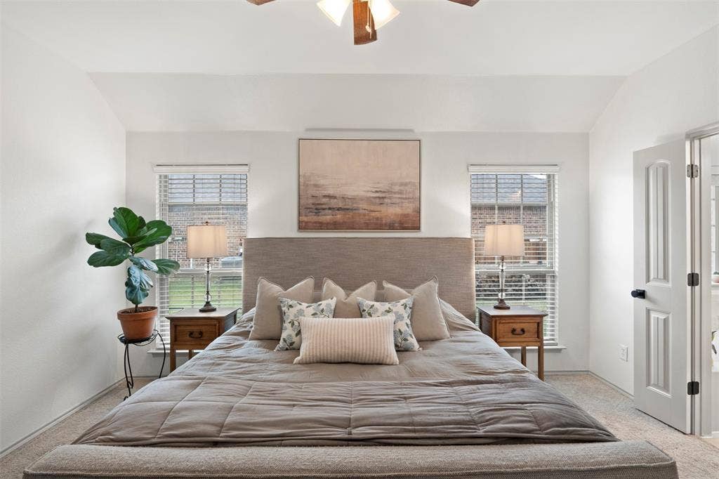 2189 Liriope Lane, Waxahachie, TX 75165 The primary suite connects directly to its private bath while still providing ample wall space and flexibility for additional furniture.