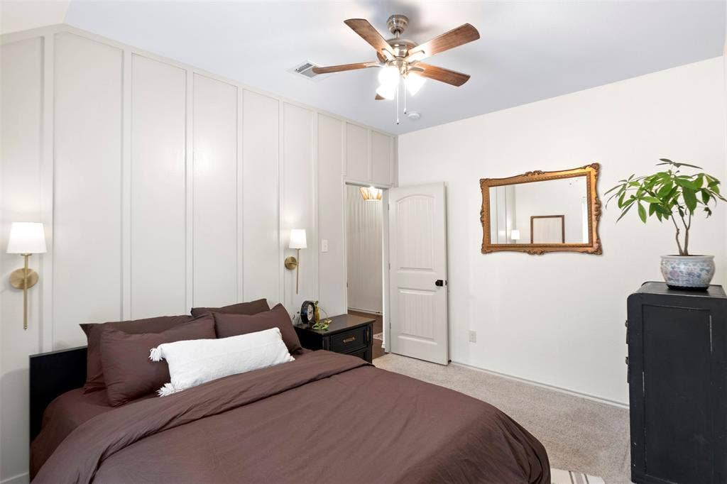2189 Liriope Lane, Waxahachie, TX 75165 Another angle shows the bedroom’s comfortable proportions and added architectural detail along the accent wall.