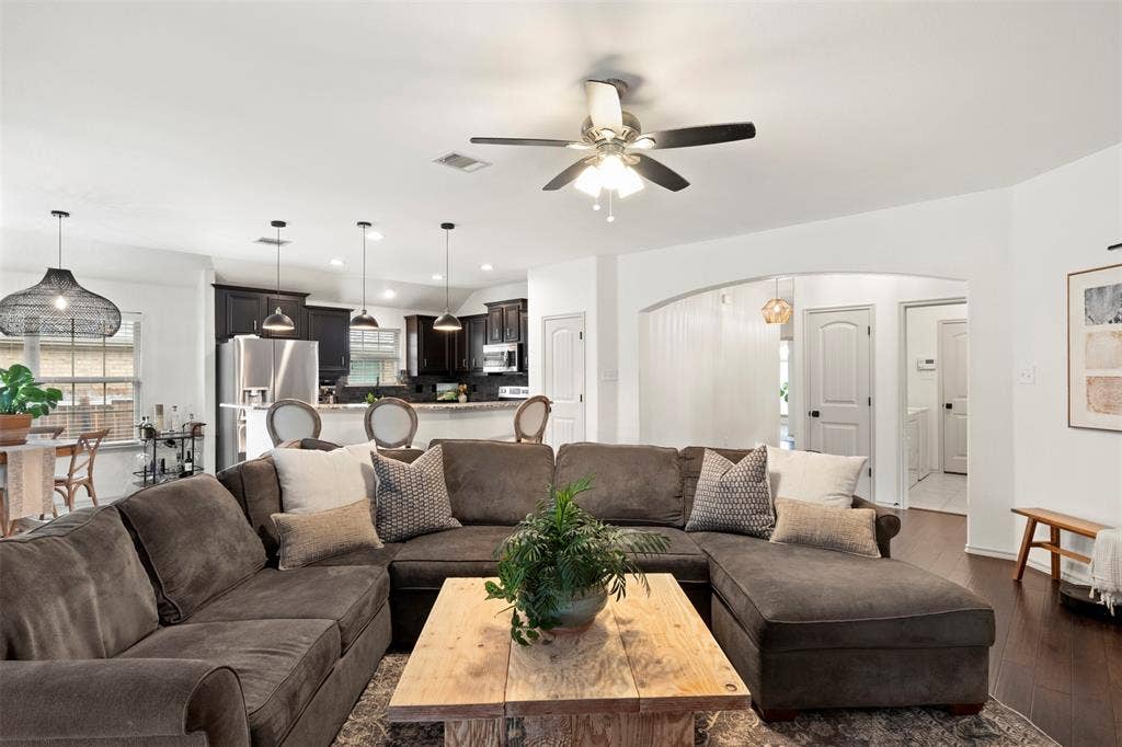 2189 Liriope Lane, Waxahachie, TX 75165 The living room flows directly into the kitchen and breakfast area, creating one connected space for everyday living and entertaining.
