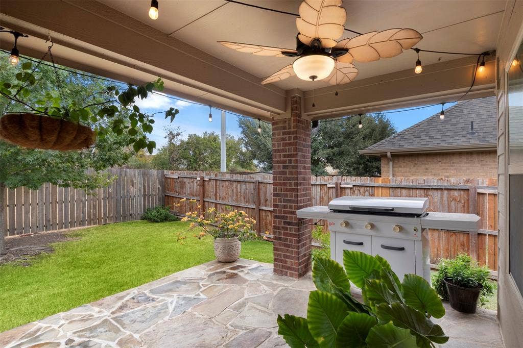 2189 Liriope Lane, Waxahachie, TX 75165 A closer look at the covered patio highlights the generous entertaining space and easy connection to the backyard.