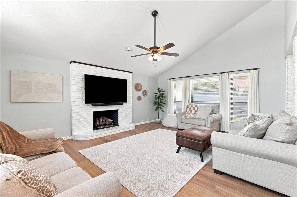 924 Thoreau Lane, Allen, TX 75002 Large living room just off of the entry. Gas fireplace with logs.