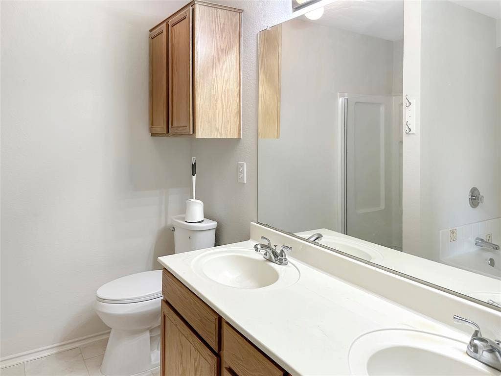 3457 Newgate Street, Midlothian, TX 76065 Bathroom with a shower, double vanity, tile patterned floors, and a bathtub
