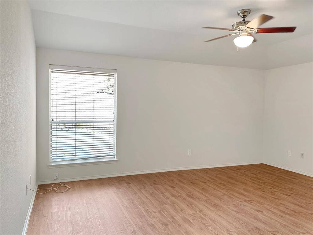 3457 Newgate Street, Midlothian, TX 76065 Spare room featuring light wood-type flooring and a ceiling fan