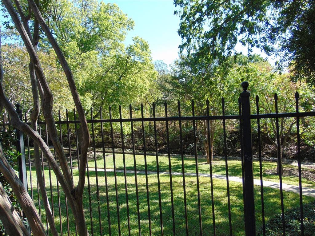 3041 Waterfront Circle, Garland, TX 75042 Overlooks walking trail and green belt.