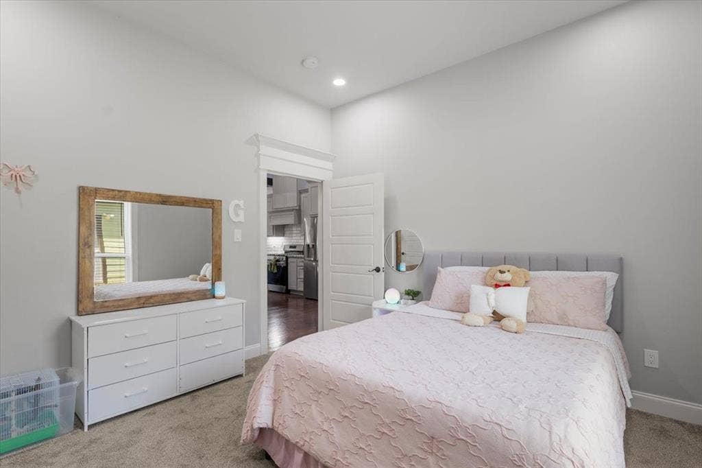 16136 County Road 1134=, Tyler, TX 75709 Recessed ceiling lighting, light gray wall color, carpet flooring, crown molding, and white trim