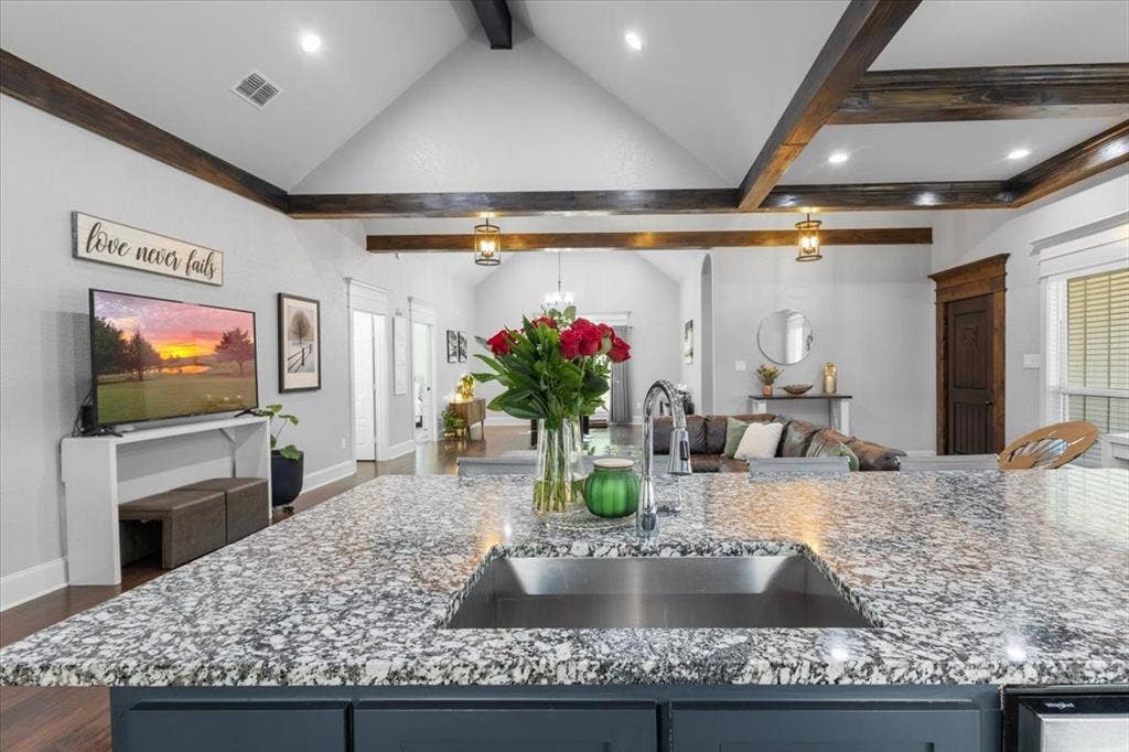 16136 County Road 1134=, Tyler, TX 75709 Granite countertop with an undermount sink and a gooseneck faucet