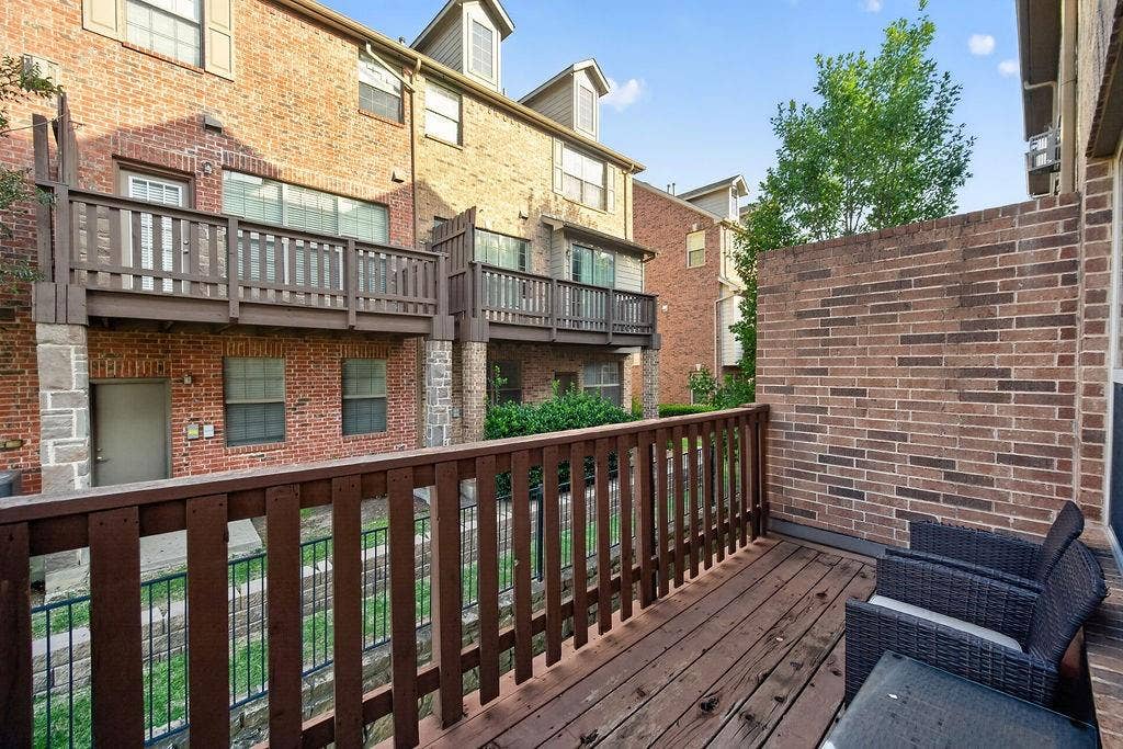 7880 Oxer Drive, Irving, TX 75063 Private wood-finish deck with brick privacy wall