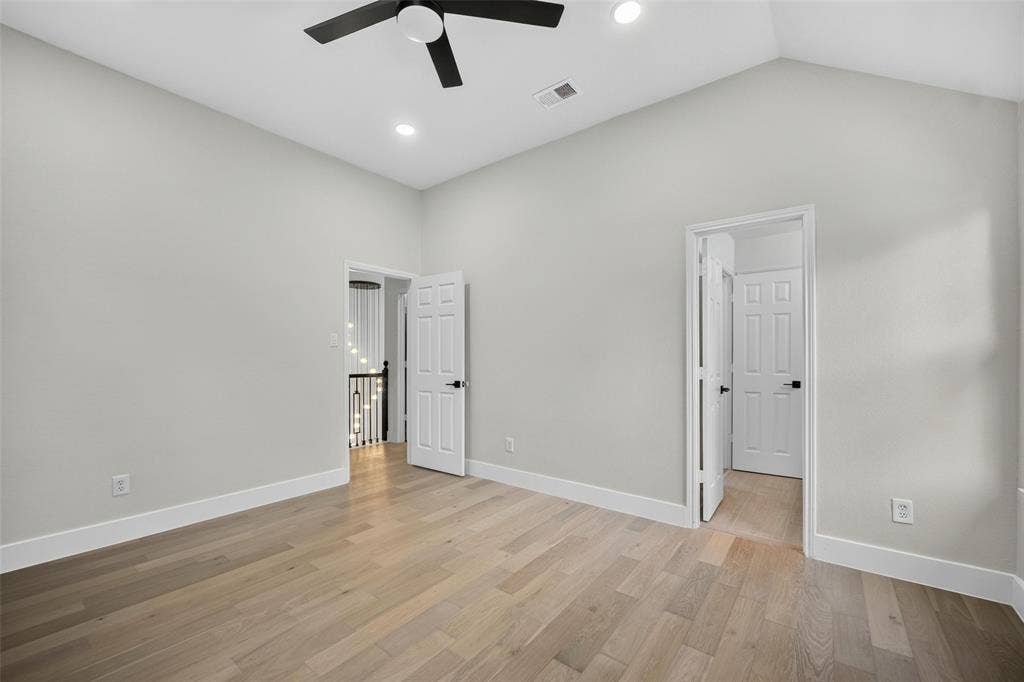 3041 Hillingdon Drive, Richardson, TX 75082 Vaulted ceiling with a ceiling fan, light wood-finish flooring, recessed lighting, and white trim