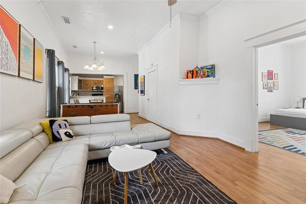 4112 Congress Avenue, Dallas, TX 75219 Hardwood flooring throughout, crown molding, and recessed lighting