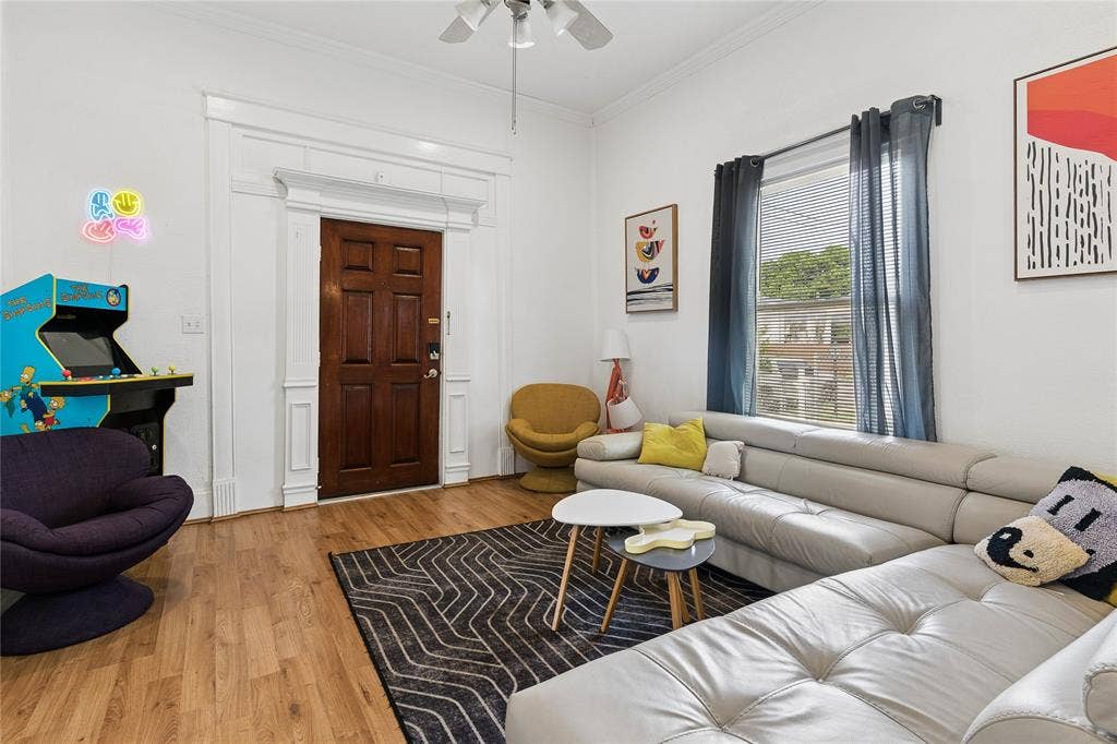 4112 Congress Avenue, Dallas, TX 75219 Warm wood-finish flooring complements the white walls