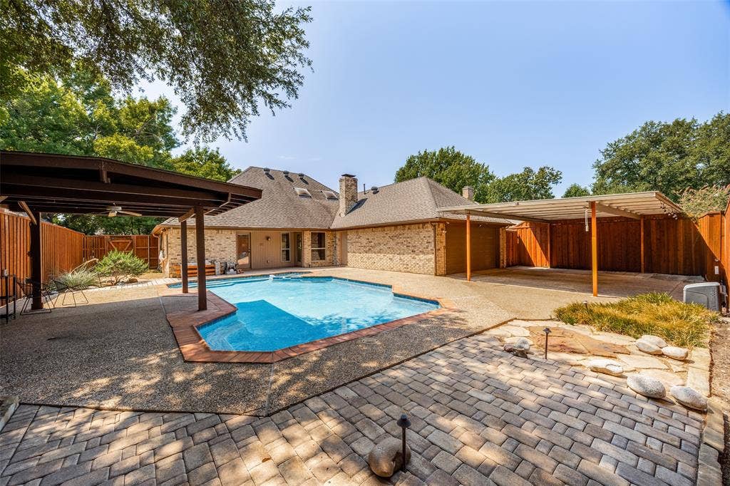 6223 Fox Trail, Dallas, TX 75248 The rolling gate across the backyard was installed in 2020.