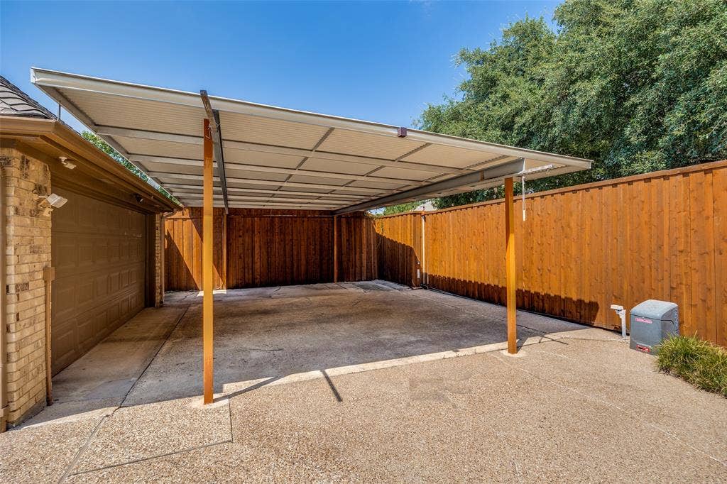 6223 Fox Trail, Dallas, TX 75248 Additional covered parking under the carport.