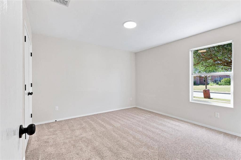 1406 Quail Meadow Drive, Wylie, TX 75098 Neutral wall color, recessed ceiling light, carpeted flooring, and a single window