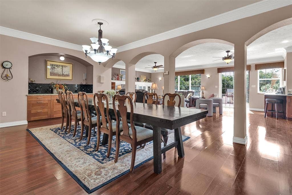 2720 Oates Drive, Mesquite, TX 75150 Expansive interior with wood-finish flooring and archway detailing