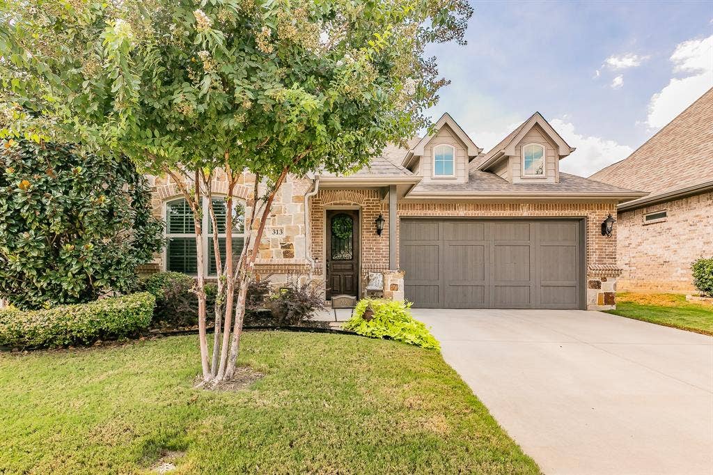 313 Elkhorn Trail, Keller, TX 76248 Brick and stone exterior with architectural dormer windows