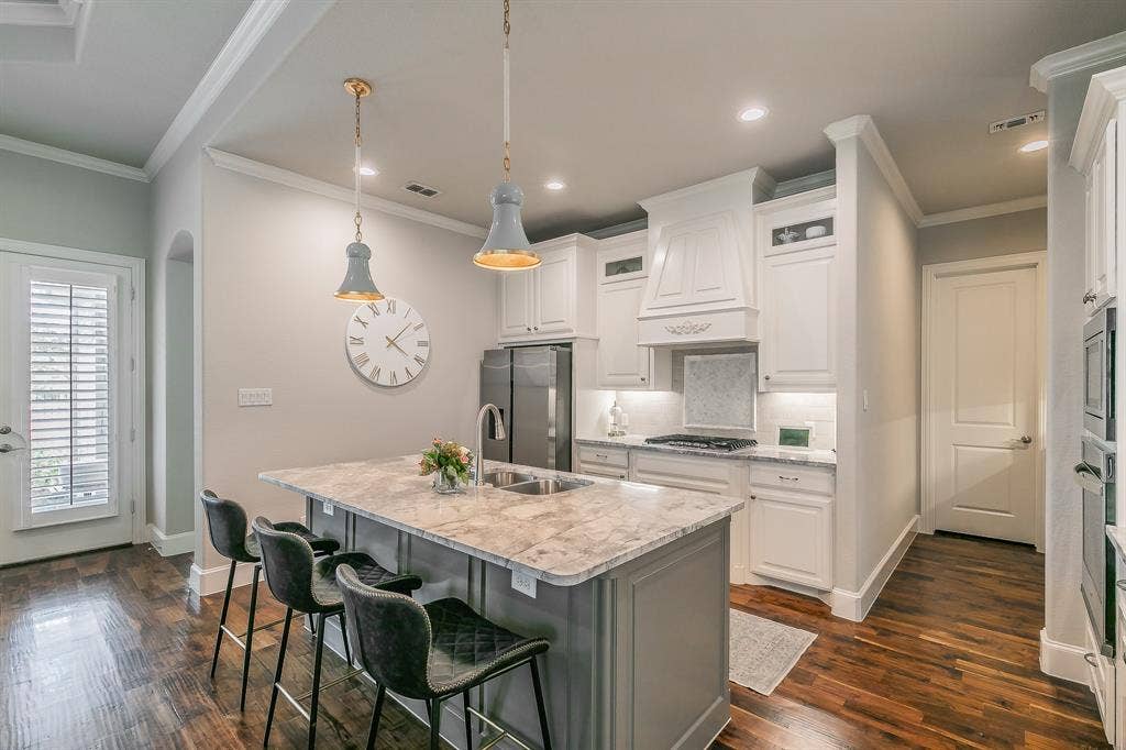 313 Elkhorn Trail, Keller, TX 76248 Kitchen featuring a center island with sink, white shaker cabinetry, recessed lighting