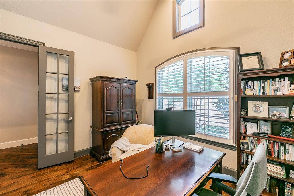 313 Elkhorn Trail, Keller, TX 76248 Hardwood flooring, arched window, secondary upper window, French doors.