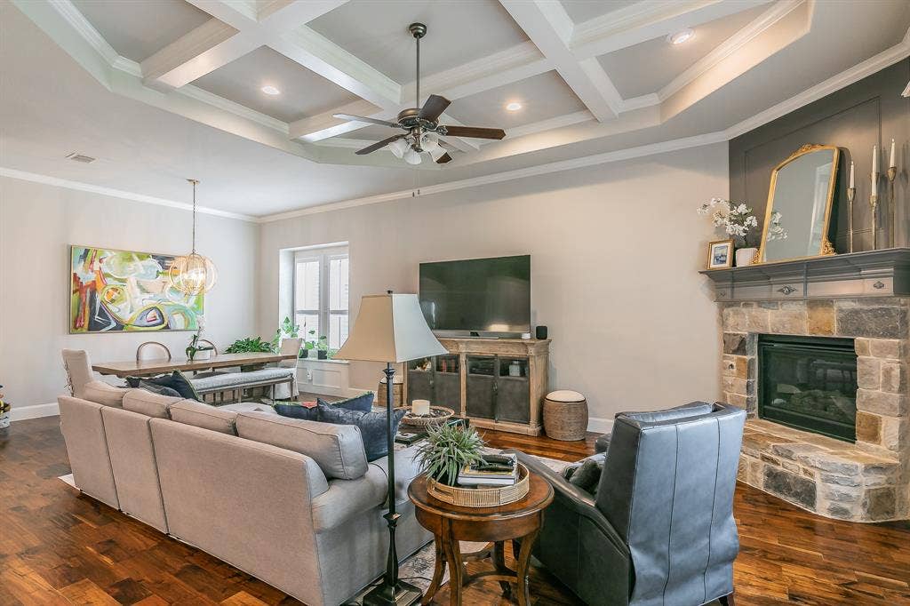 313 Elkhorn Trail, Keller, TX 76248 Coffered ceiling with recessed lighting, stone-clad fireplace with mantel, molding