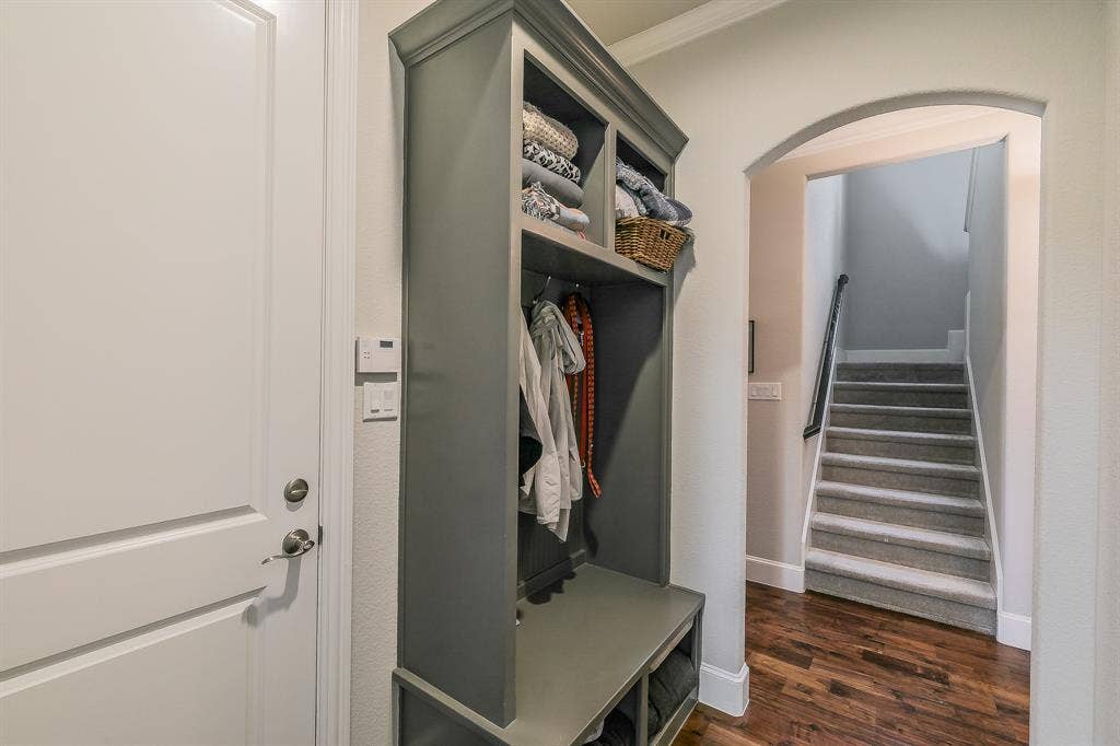 313 Elkhorn Trail, Keller, TX 76248 Built-in storage cabinet with hanging space, bench seating, and upper shelving