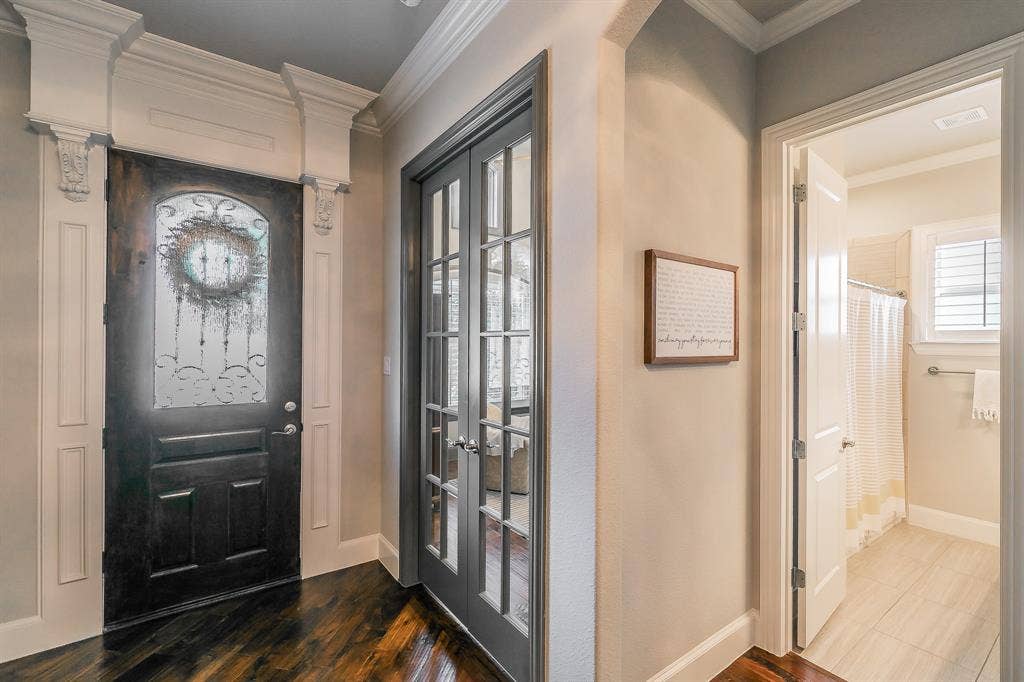 313 Elkhorn Trail, Keller, TX 76248 Wood-finish entry door with decorative glass insert