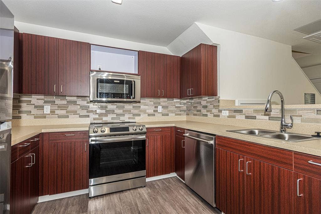 3022 Forest Lane, #116, Dallas, TX 75234 Kitchen has lots of cabinet space