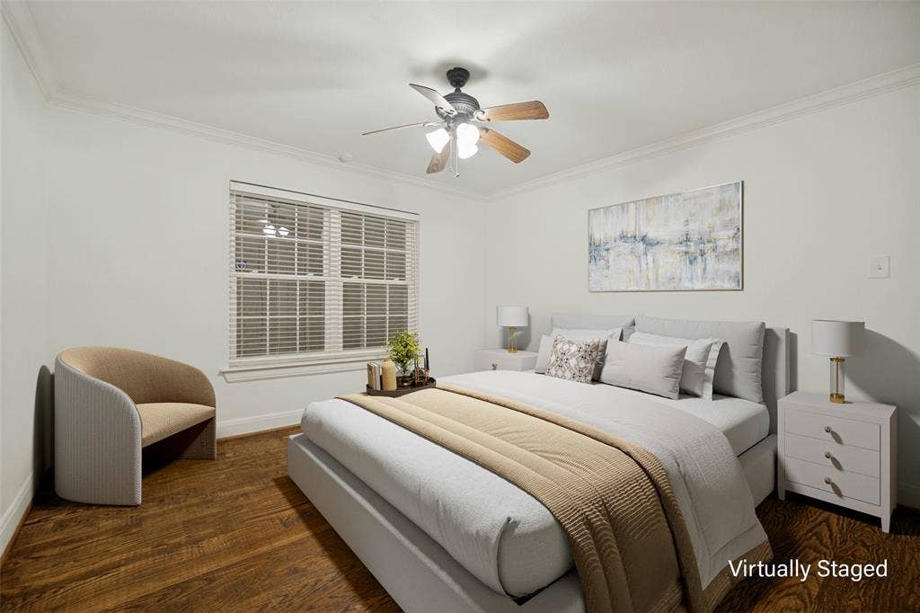 5818 E University Boulevard, #138, Dallas, TX 75206 Wood-finish flooring, crown molding, double-paned window, and a ceiling fan with integrated lighting